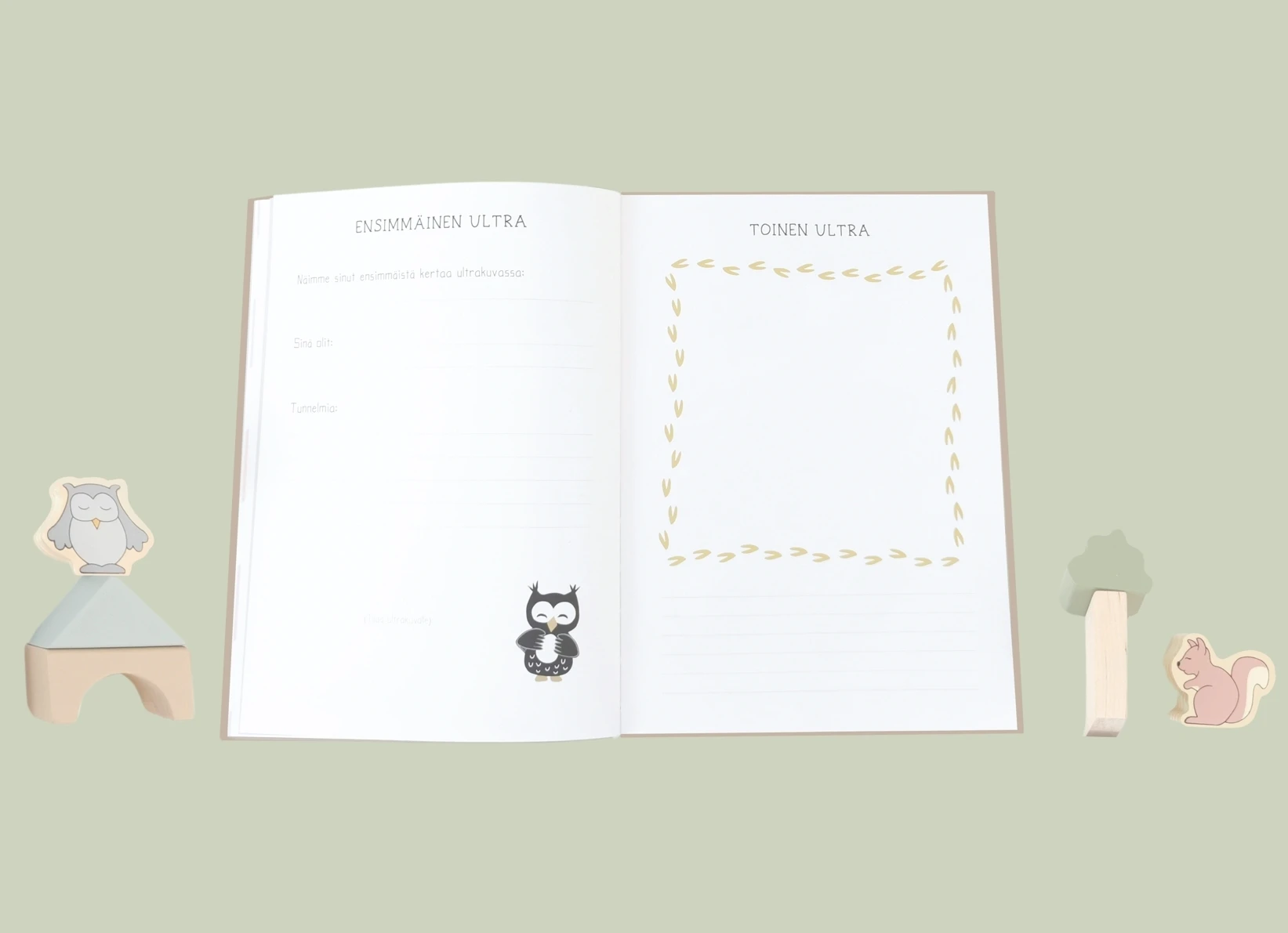 Vauvakirjan sivu, jossa voi kertoa ensimmäisistä ultrista ja liimata ultrakuvat