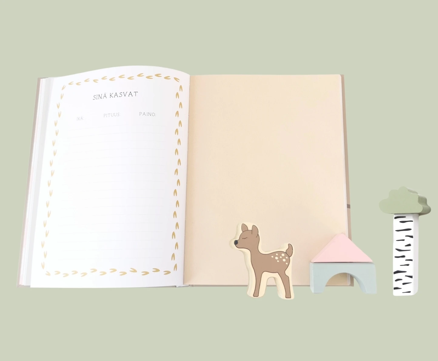 Vauvakirjassa oleva lapsen kasvunseurantataulukko, johon voi kirjata pituuden ja painon eri ikäkuukausina