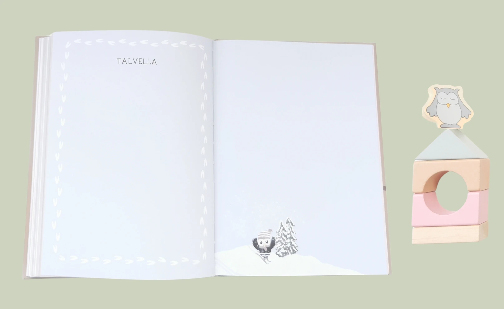 Vauvakirjan sivu, jonne voi kirjata lapsen seikkailuja talvella